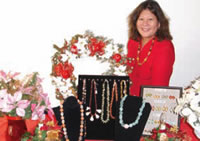 Deanna Mukai Craft sale coordinator Deanna Mukai (RA) with hand-made jewelry.